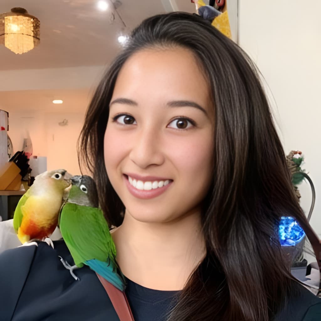 Samantha with two conures on her shoulder, cheek to cheek