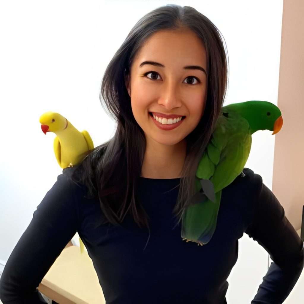 Samantha of Bird Sitting Toronto with two of the birds she looks after